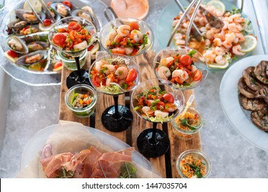 Shrimp Cocktail, Tabbouleh And Carrot Salad Vegetables During Hotel Brunch Buffet Outside Outdoor In The Garden By  The Pool. Fresh Food Buffet Brunch Catering Dining Eating Party Sharing Concept