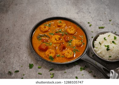 Shrimp In Curry Coconut Sauce With Rice In A Bowl - Curried Prawns