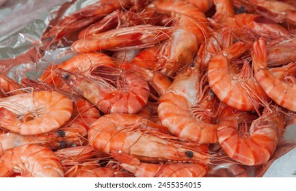 Shrimp. Fresh raw shrimps at the market for sell. Heap of prawns with top view. Shrimp pattern, prawn texture.