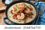 Shrimp and Grits: Southern dish of tender shrimp in a savory sauce served over creamy, buttery grits, a true comfort food.