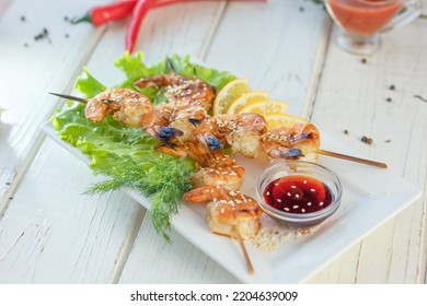 Shrimp Kebab On A Plate Over The Table