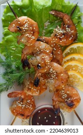 Shrimp Kebab On A Plate Over The Table