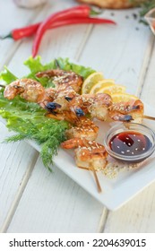 Shrimp Kebab On A Plate Over The Table