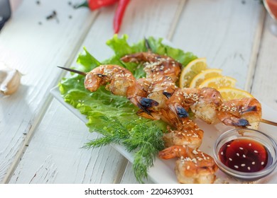 Shrimp Kebab On A Plate Over The Table