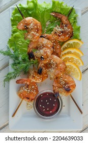 Shrimp Kebab On A Plate Over The Table