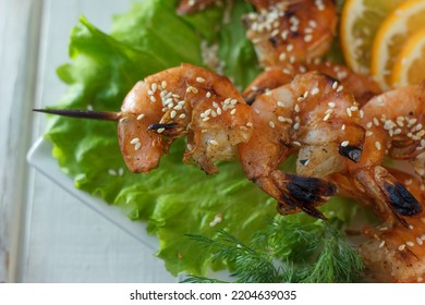 Shrimp Kebab On A Plate Over The Table