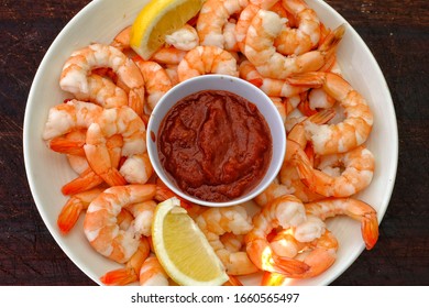 Shrimp With Lemon Slice And Sauce Shot From Above
