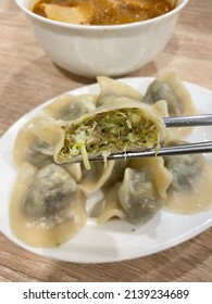 Shrimp And Pork Wontons With House Soy Sauce. Top Grade Fresh Shrimp And Finely Ground Pork Wrapped In Thin And Delicate Wonton Skins, Dressed With A Special Blend Of Soy Sauce.