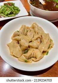 Shrimp And Pork Wontons With House Soy Sauce. Top Grade Fresh Shrimp And Finely Ground Pork Wrapped In Thin And Delicate Wonton Skins, Dressed With A Special Blend Of Soy Sauce.