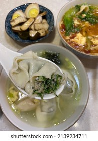 Shrimp And Pork Wontons With House Soy Sauce. Top Grade Fresh Shrimp And Finely Ground Pork Wrapped In Thin And Delicate Wonton Skins, Dressed With A Special Blend Of Soy Sauce.