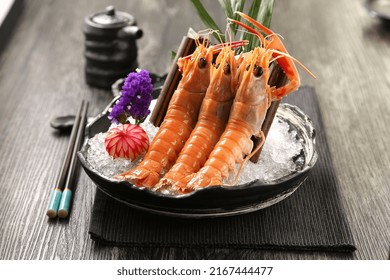 Shrimp Sashimi On A Wooden Board