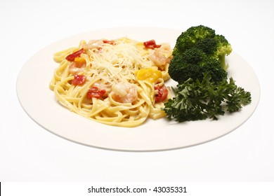 Shrimp Scampi With Linguine And A Side Of Broccoli.