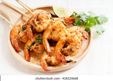 Shrimp Sriracha Kebabs With Lime And Cilantro Leaves