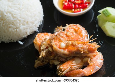 Shrimp Stir-fried With Garlic And Pepper,Thai Cuisine,  Thai Food Close Up, Goong Tod Kra Thiam Prik Thai With Spoon And Fork