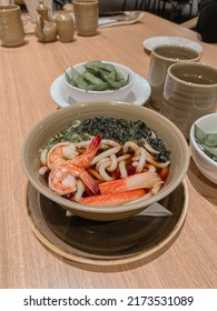 Shrimp Udon Japanese Food With Tea And Edamame Beans At Restaurant