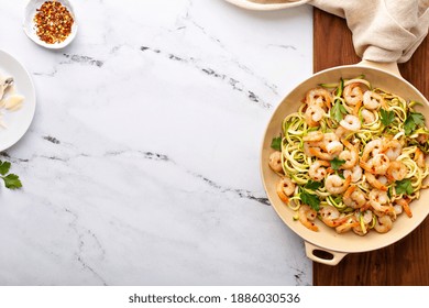 Shrimp And Zucchini Noodles Or Zoodles Pasta With Parmesan And Chili Flakes Overhead With Copy Space