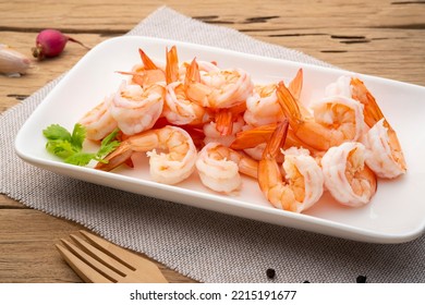 Shrimps, Boiled Prawns in white plate, Shrimp tails ready for cooking,Seafood ingredient