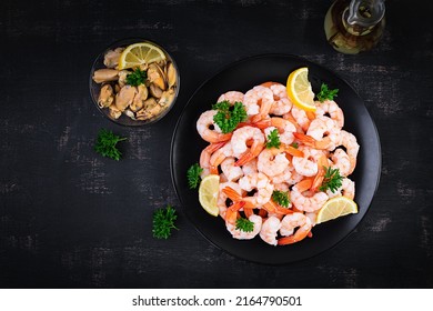 Shrimps, Prawns On Black Plate. Boiled Shrimps, Prawns. Seafood. Top View, Overhead