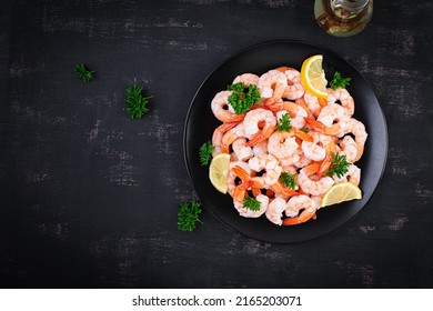 Shrimps, Prawns On Black Plate. Boiled Shrimps, Prawns. Seafood. Top View, Overhead