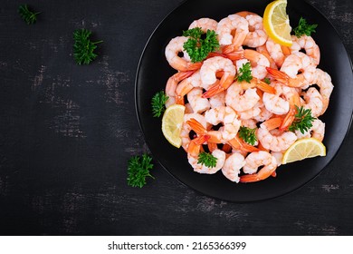 Shrimps, Prawns On Black Plate. Boiled Shrimps, Prawns. Seafood. Top View, Overhead