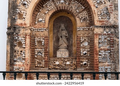 Shrine altar made from human bones and skulls inside the Church of Se in Faro town, Algarve region, Portugal