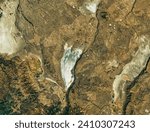 Shrinking Lake Abert. As the lake in southern Oregon dries up, the remaining water is becoming too salty to support key food sources for birds. Elements of this image furnished by NASA.