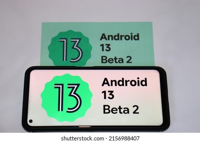 Shumen, Bulgaria- May 17 2022: Phone with Android 13 Beta 2 on a paper with Android 13 Beta 2 ads
