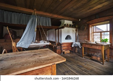 SHUSHENSKOE/RUSSIA - July 25, 2019: Interior of old russian poor house in Shushenskoe village