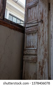 Shutter And Clerestory Window, Peeling Paint And Water Damage, Vertical Aspect