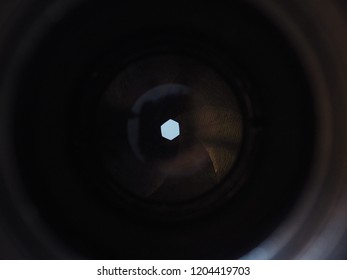 shutter device that allows light to pass for a determined period, exposing photographic film or photosensitive digital sensor to light in order to capture a permanent image of a scene