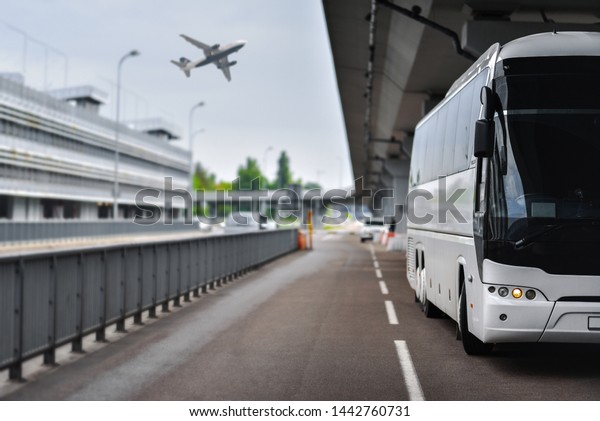 shuttle\
bus brought people to the airport for the\
flight