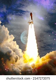 Shuttle launch in the clouds to outer space. Dark space with stars on background.Spaceship flight. Elements of this image furnished by NASA
