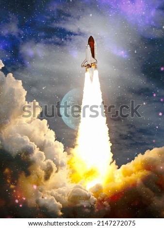 Shuttle launch in the clouds to outer space. Dark space with stars on background.Spaceship flight. Elements of this image furnished by NASA