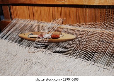 shuttle on the antique loom and thread