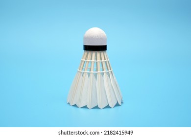 Shuttlecock badminton on blue background