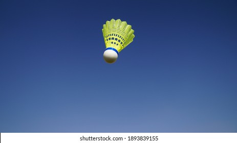 Shuttlecock Flying In The Blue Sky