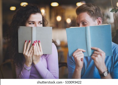 Shy Couple In Love Flirting While Studying