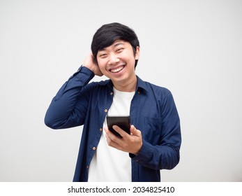 Shy Man Touch His Head And Holding Mobile Phone Smile Face White Background