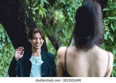 A Shy Teenage Boy Awkwardly Says Hi To His Crush During A Chance Encounter At The Park.