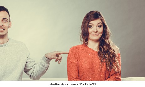 Shy Woman And Man Sitting On Sofa Couch Next Each Other. First Date. Attractive Girl And Handsome Guy Meeting Dating And Trying To Talk. Male Touching Picking Up Female. Instagram Filtered.