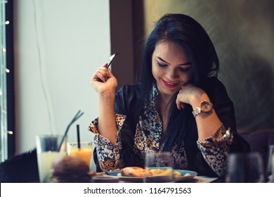 Shy Woman On First Date With Her Co-worker Being Nervous And Happy At The Same Time.