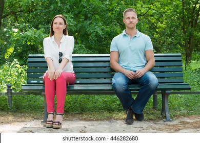 Shy Young Man And Woman  On First Date In Park