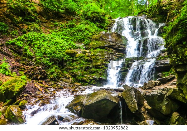 Shypit Forest Rock Waterfall Frontal View in\
the Ukrainian Carpathian\
Mountains