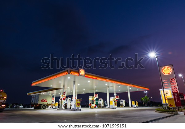 Si\
Racha, Chonburi /Thailand - April 18, 2018: Shell gas station blue\
sky background during sunset. Royal Dutch Shell sold its Australian\
Shell retail operations to Dutch company Vitol in\
2014