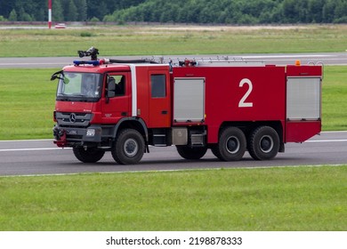 SIAULIAI, LITHUANIA – JULY, 2022: Siauliai Airport Military Mercedes Benz Actros 3360 Firetruck.