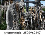 Siauliai, Lithuania - July 22, 2024: Hill of Crosses (Kryziu kalnas). 
Hill of Crosses is a major site of Catholic pilgrimage in Lithuania.