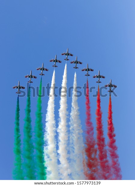SIAULIAI /\
LITHUANIA - July 27, 2019: Italian Air Force aerobatic\
demonstration team Frecce Tricolori flying display during air show\
Falcon Wings 2019 at Siauliai Air\
Base