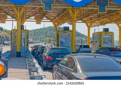 SIBENIK, CROATIA - August 13 2021: Traffic waiting at toll booths in Dubrava exit from A1 highway in summer time.