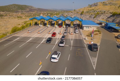 SIBENIK, CROATIA - August 13 2021: Aerial view of the traffic waiting at toll booths in Dubrava exit from A1 highway in summer time.