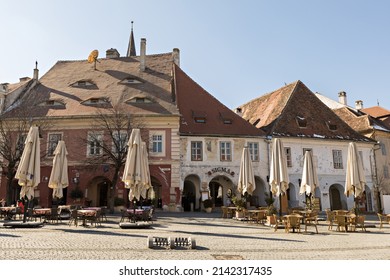 SIBIU, ROMANIA - March 2022: Traditional cafe in the old town of Sibiu in Romania